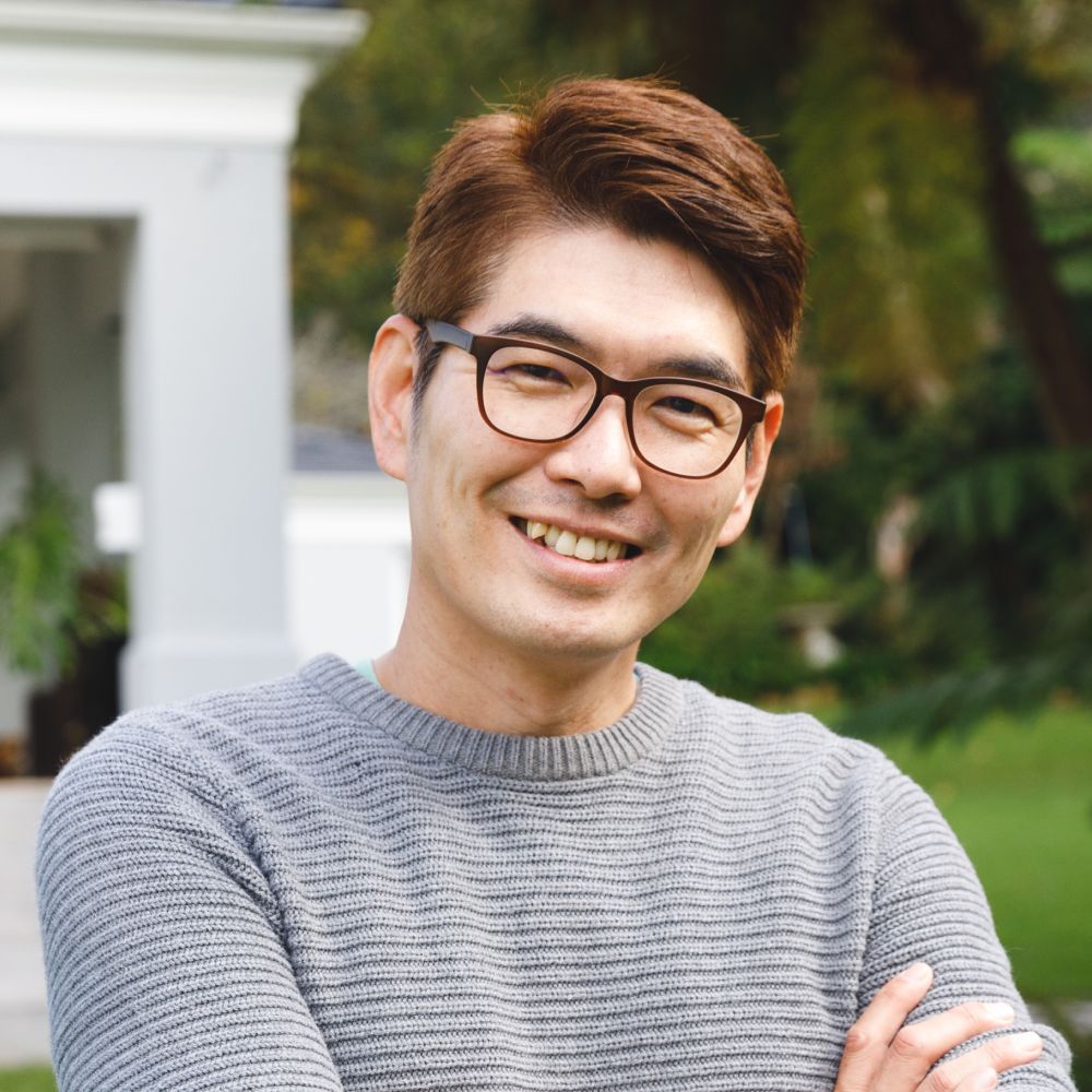 portrait of happy asian man wearing glasses smilin rtwnw4m 1.jpg