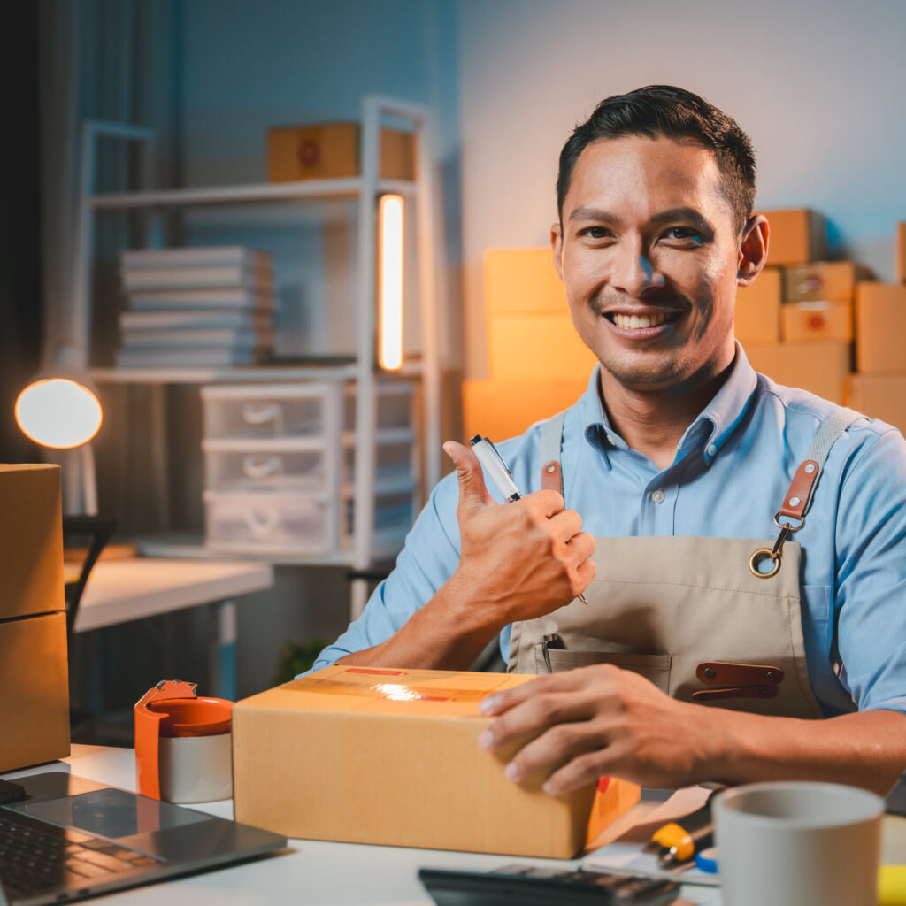 young male entrepreneur selling products online pr 5xklbrn scaled.jpg